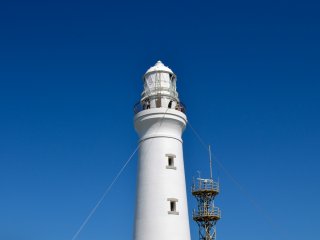 Inubosaki Lighthouse, the symbol of Cape Inunosaki. Very windy at the top, the height is 52 meters above sea level. There are 99 steps to climb to reach its outside observation deck