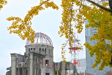 <p>The dome is now flanked by tall modern buildings:&nbsp;Hiroshima&#39;s Atomic Bomb Dome</p>