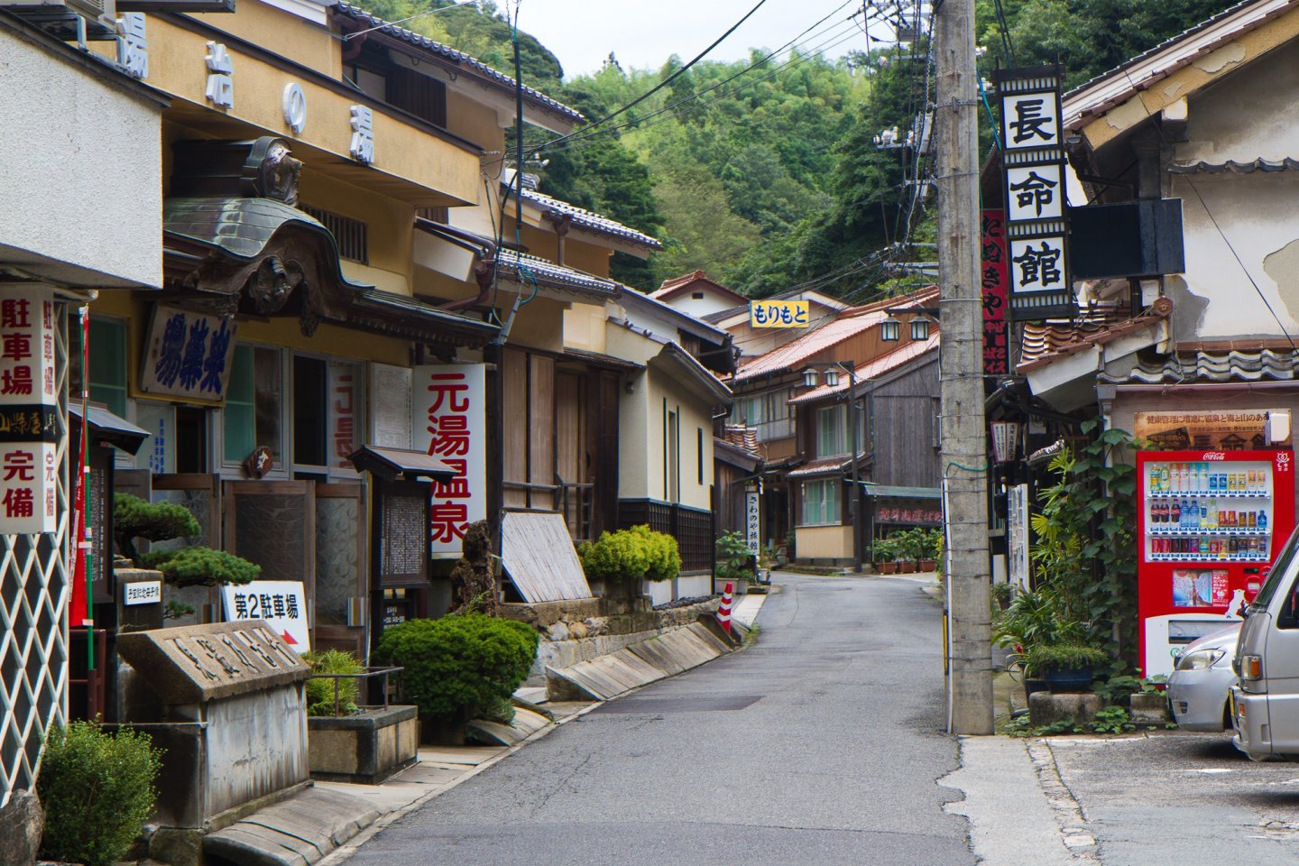 Moto-yu, on the left, is one of the several bathhouses along the single-lane road of Yunotsu