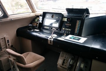 <p>A view of the driver&#39;s seat in one of the bullet trains in the front lawn area</p>