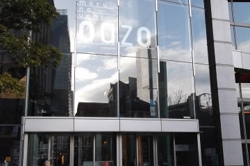 <p>More of Marunouchi reflected in the front of the building</p>