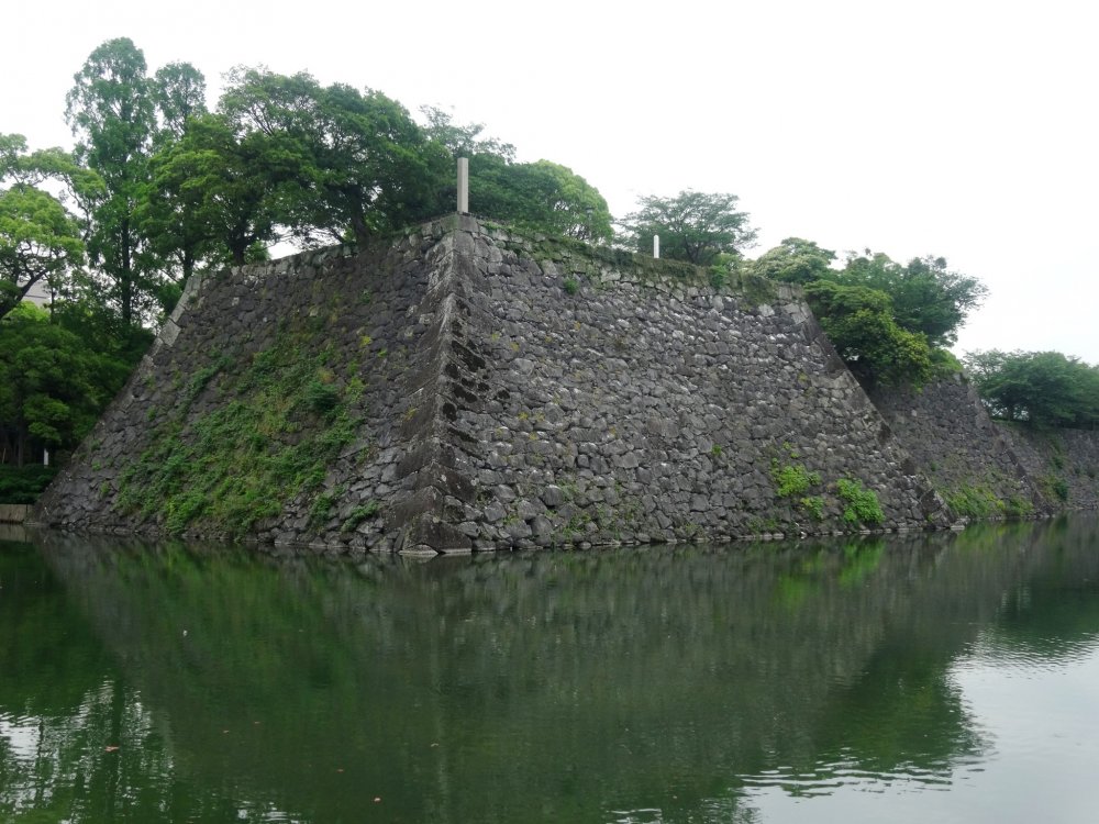 The high stone walls are all that remain of Yatsushiro Castle