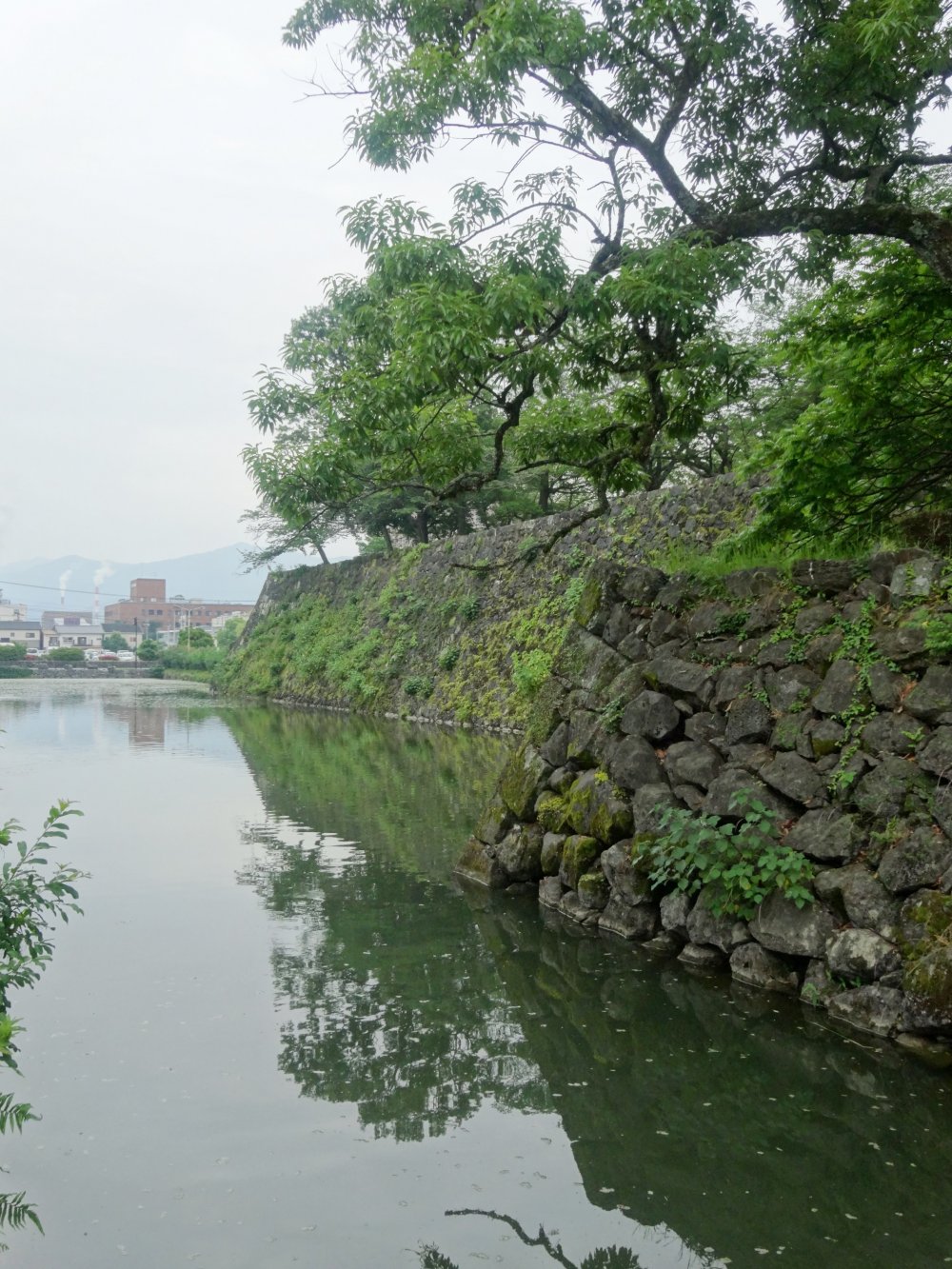 The moat that once encircled the castle is also still intact