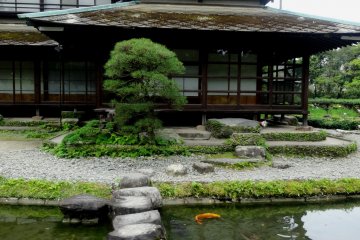 <p>A path of stepping stones leads to the 350 year old teahouse</p>