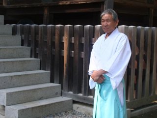 A shinto priest within the grounds of Konpira-san