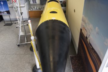 <p>A model of one of the earliest rockets developed by JAXA, to scale. Notice how small it is compared to the rockets of today that have succeeded in entering outer space.</p>