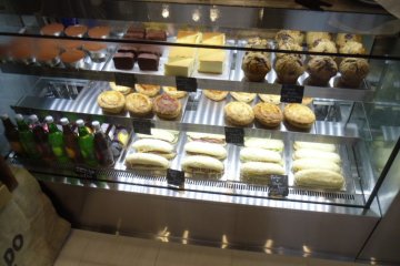 <p>The mouth-watering food case shows a range of sweet and savory treats</p>