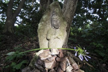 <p>Small Jizo statues like this can be found all over Tateyama, reminding you that you are still very much in the temple grounds of Kanzanji.</p>