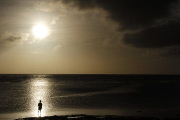 <p>Watch the sunset from one of the many beaches in Okinawa.&nbsp;</p>