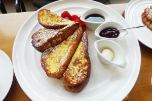 The New York style French toast is served with a variety of jams