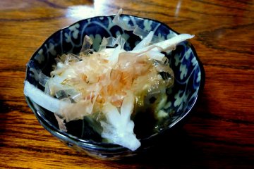<p>Tofu topped with root vegetable (some kind of potato?) and katsuo-bushi</p>