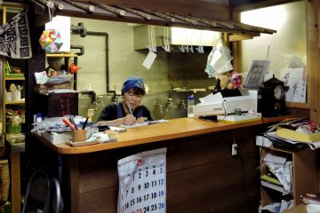<p>One of the cooks behind the counter</p>