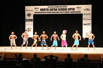 <p>Members of the physique competition flex pose for the judges</p>