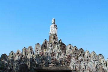 <p>The stone Buddha pyramid with a big statue on top</p>

