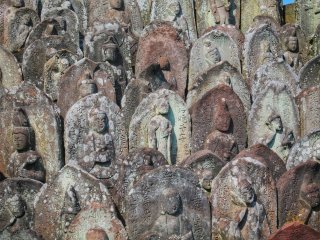 A close-up of the many Buddha statues
