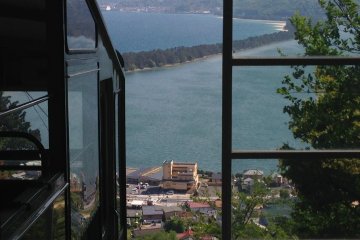 <p>Take a glimpse of Amanohashidate from the top cable car station.</p>
