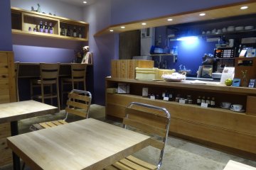 <p>For solo diners, there is also a long bar across the back of the shop</p>