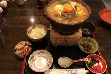 <p>There were some restaurants along the way back to the bus terminal, such as this miso nabe (hot pot).</p>