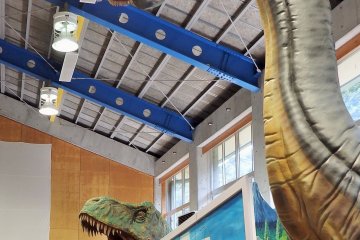 <p>Dinosaurs tower over the exhibits.</p>