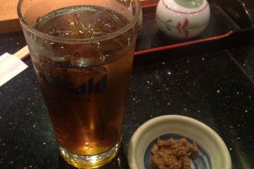 <p>Syo-chu with oolong tea, along with other alcoholic beverages are available during dinner time, a scene you will rarely see during th lunch break</p>
