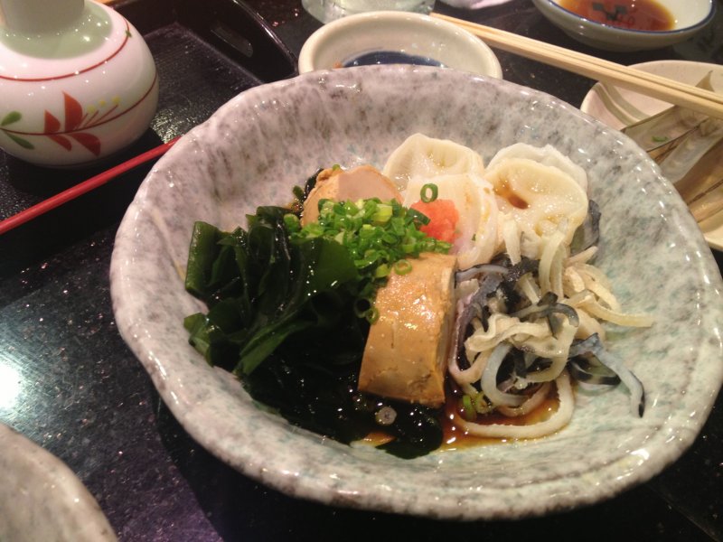 <p>A plate of ponzu sauced liver, blowfish skin, octopus chops and seaweed. Sour and fresh at the same time</p>
