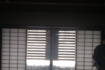 <p>The view from the downstairs tatami room with the light coming in through the snow guards and the orange light from the indirect ceiling lighting</p>
