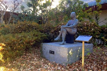 As you walk towards the library, you&#39;ll pass by this statue of a woman sitting
