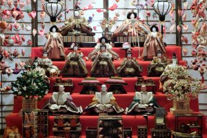 Hundreds of ornament strings and beautiful antique hina dolls are on display.