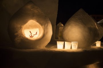 One of the many candle lit snow lanterns
