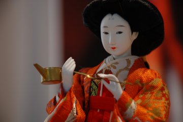 Close up of a doll at the information center.