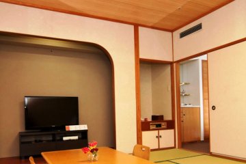 Japanese style ryokan like rooms with tatami mats and futons