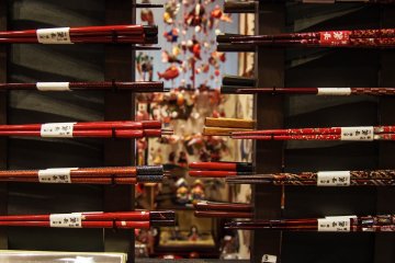 Hand-crafted chopsticks available for purchase.