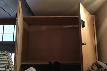 I really liked the huge cupboard at the end of the bed which could fit a regular-sized backpack into and lock