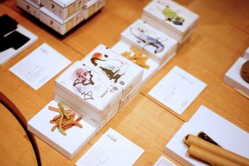 Pretty gift boxes with filled with traditional Japanese snacks