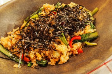 Rice dish topped with seaweed for dinner at Le Coccole