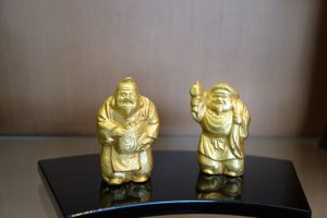 Happy, shiny buddhas pay homage to the religion