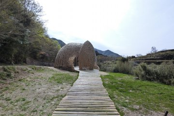 Walk along a bamboo path to approach this nest-like structure