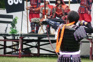 The archers (likely a Kyudo club) were entirely female - though women also participated in the melee, armoured, ferocious and obviously having a great time.