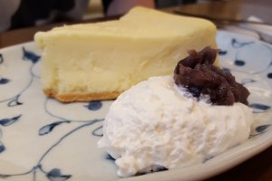 Cheese cake with red beans and whipped cream