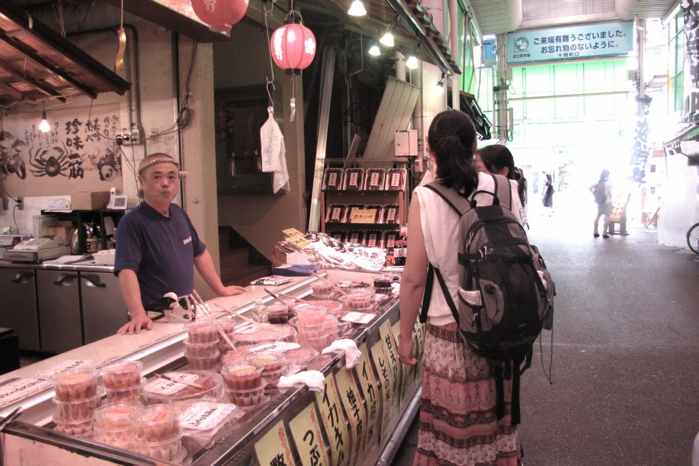 Visitors explore the Omi-cho market