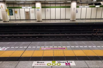 Women's only markers on the ground of the platform