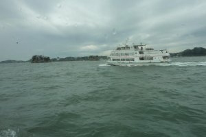 Passing another sightseeing boat in Matsushima Bay.