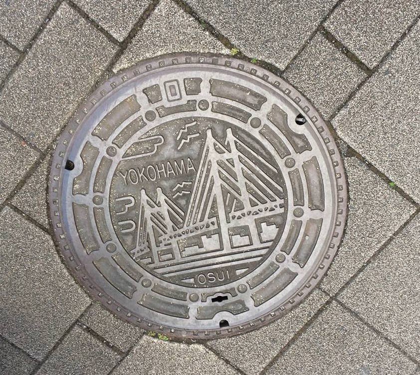 Yokohama's bridge features prominently in the area manhole cover