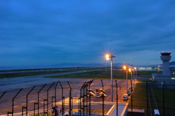 Night-time runway light-up of Kobe Airport