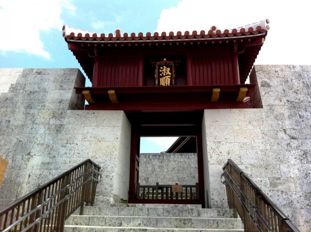 Climb the many steps to Shuri Castle a world heritage site in Naha Okinawa