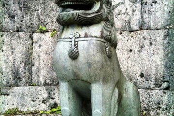 Ancient Shisa Statue guards Shuri Castle a world heritage site in Naha Okinawa