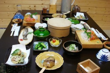 A delightful feast of sashimi salmon and grilled rice cakes at the Hanaya a Homestay like Ryokan near Nagiso on the Nakasendo between Kyoto and Tokyo