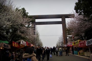 <p>The road to the shrine is lined with festival booths</p>