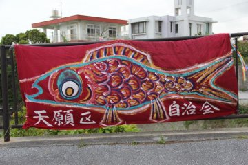 Local schools and community groups create their own carp for display along the Tengan River
