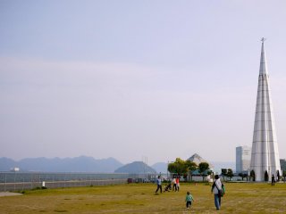 Large, open play area with a view of the islands around the port